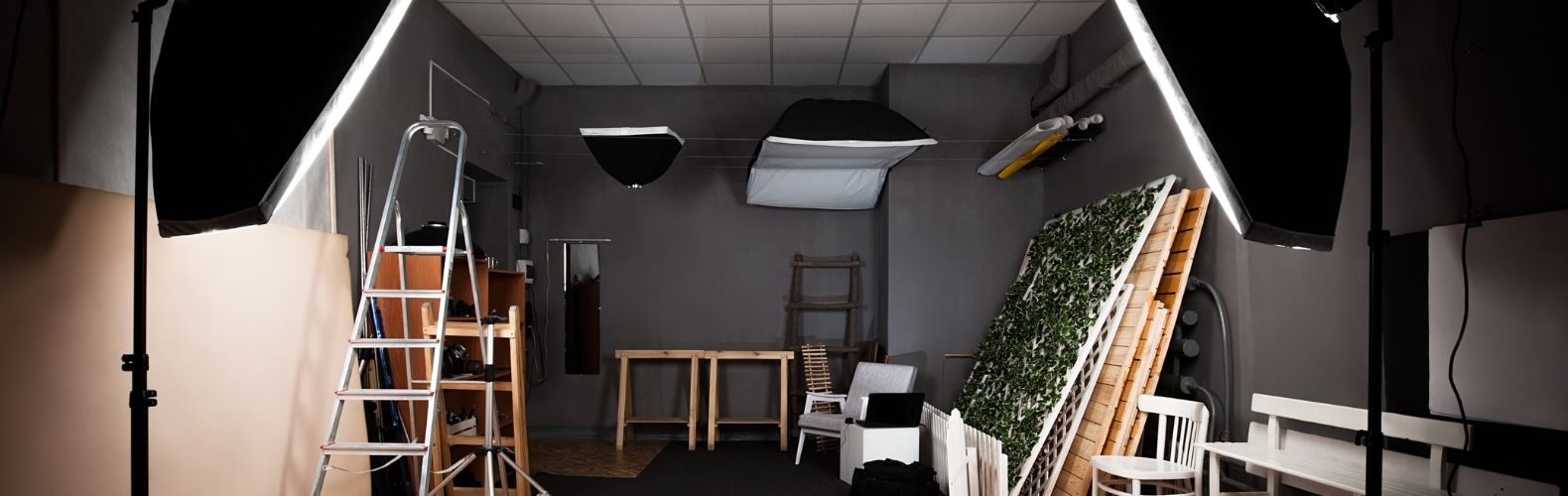 image of a photography studio backroom with various equipment such as lighting and backgrounds